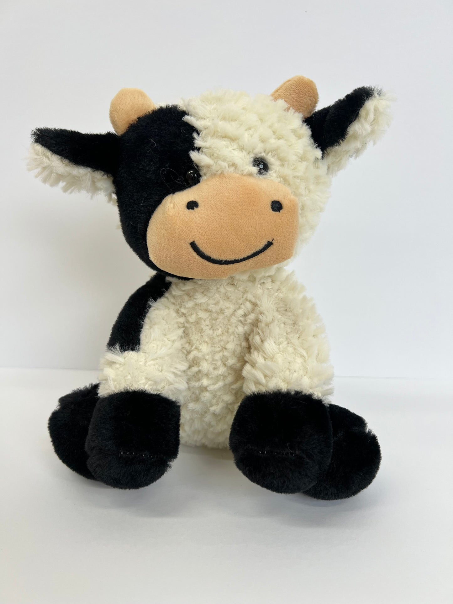 Cow plushies